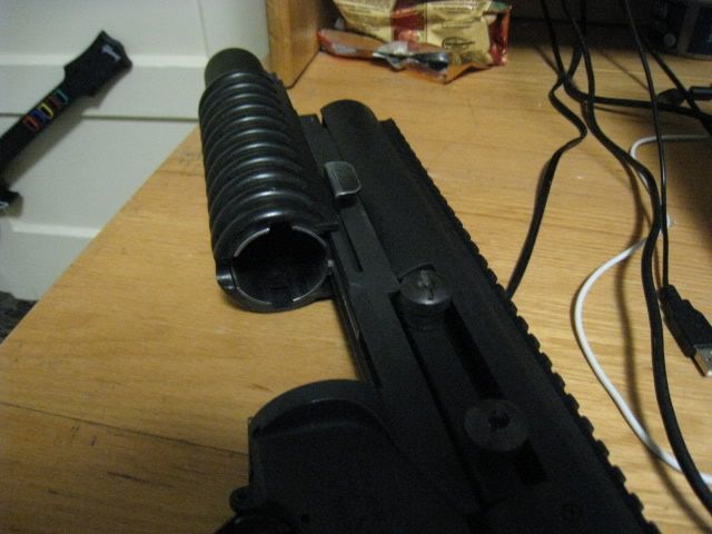 http://i8.photobucket.com/albums/a1/aznriptide859/Airsoft/KAC%20M203%20Standalone%20Launcher/IMG_9468.jpg