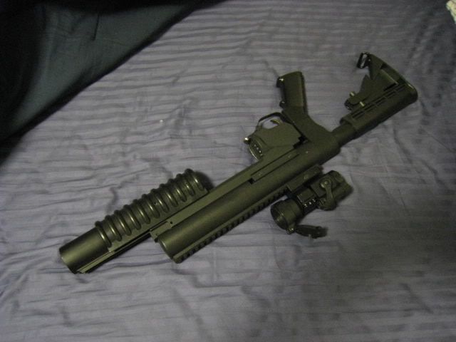 http://i8.photobucket.com/albums/a1/aznriptide859/Airsoft/KAC%20M203%20Standalone%20Launcher/IMG_9470.jpg