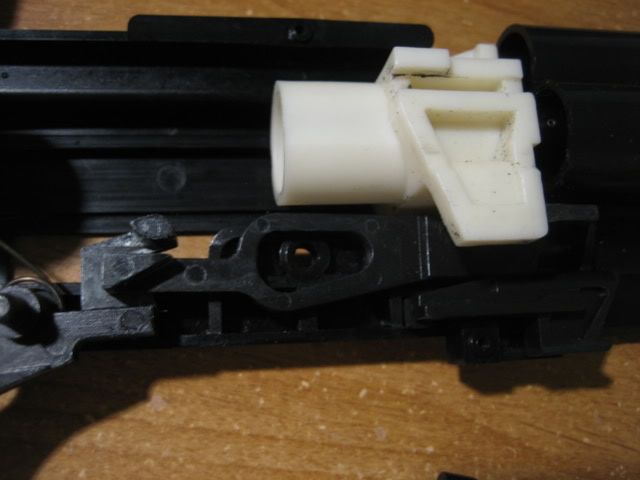 http://i8.photobucket.com/albums/a1/aznriptide859/Airsoft/TM%20M3%20Super%2090%20Disassembly%20Pics/IMG_4038.jpg