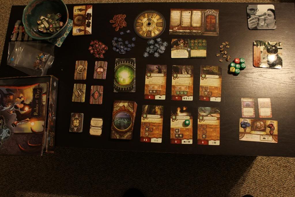 All the game's components, as well as a couple of photo coasters