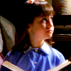 Matilda (Mara Wilson) with a book, 'Matilda,' 1996. Pictures, Images and Photos