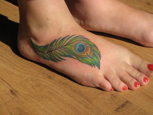 I just came across this peacock feather tattoo. I love the coloring so much 