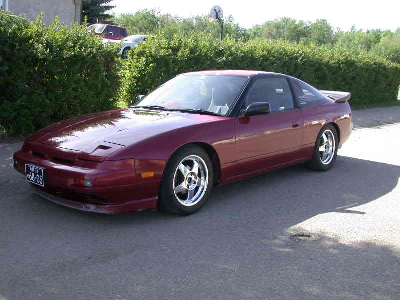 http://i8.photobucket.com/albums/a32/snatchmasterflex/180SXWanganSpoilerUnpainted001.jpg