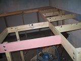 2006-07-11BeginBenchwork.jpg Begin Benchwork:   
I used 1x3 dimensional lumber for the supports.  I pre-drilled for wiring. image by jxtrrx