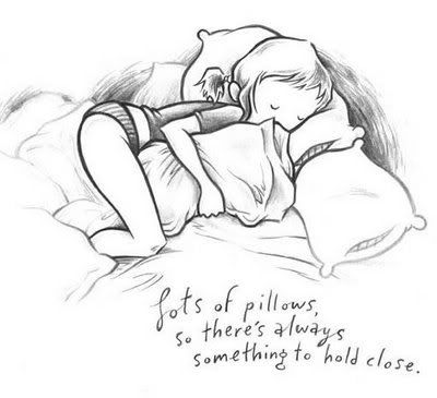Girl holding pillows