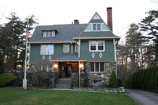 green victorian style home