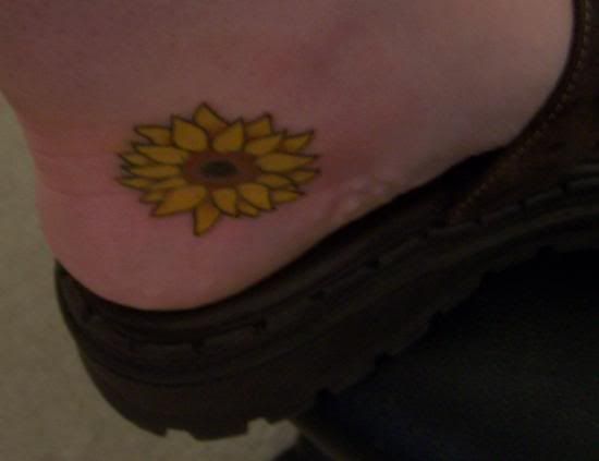 sunflower tattoo. I even have a sunflower tattoo