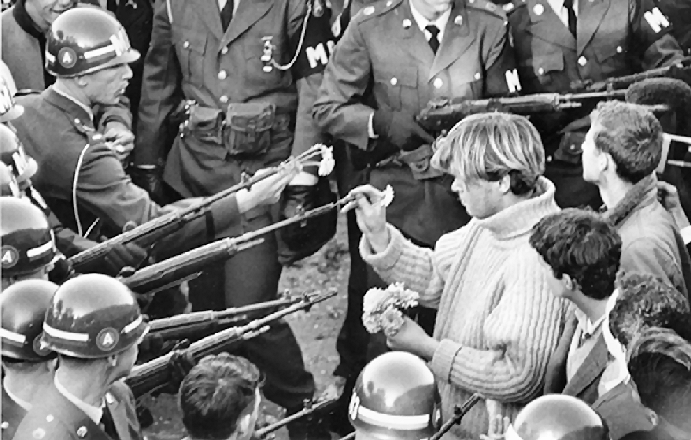 Bernie Boston's iconic photo "Flower Power," taken of protestors interacting with armed National Guardsmen in 1967.