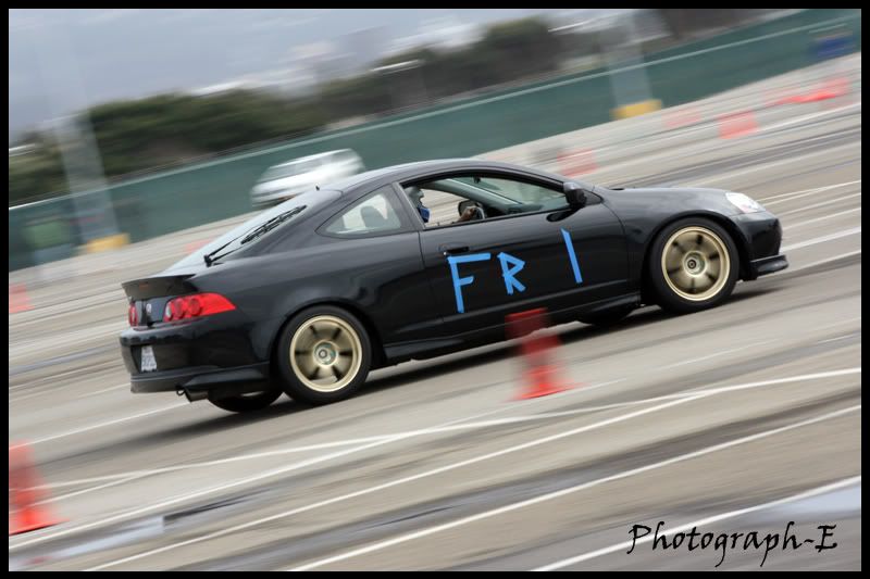 IMAGE: http://i8.photobucket.com/albums/a46/smurfsvt/autox%202%2025/Autocross305small.jpg