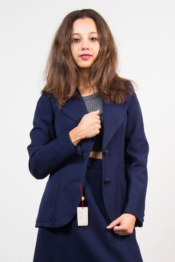 navy blue skirt and jacket